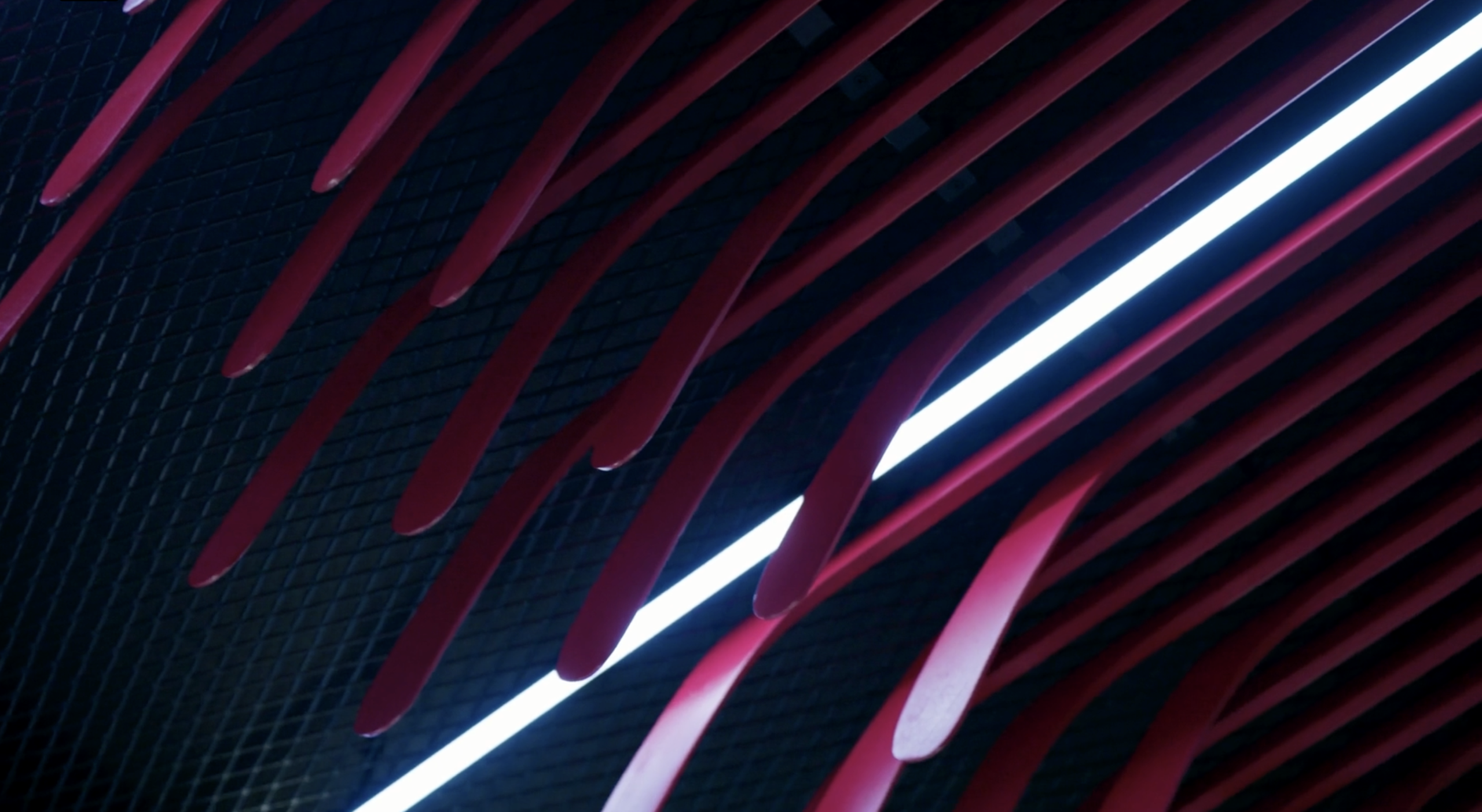 94 Hockey Sticks on the Locker Room Ceiling